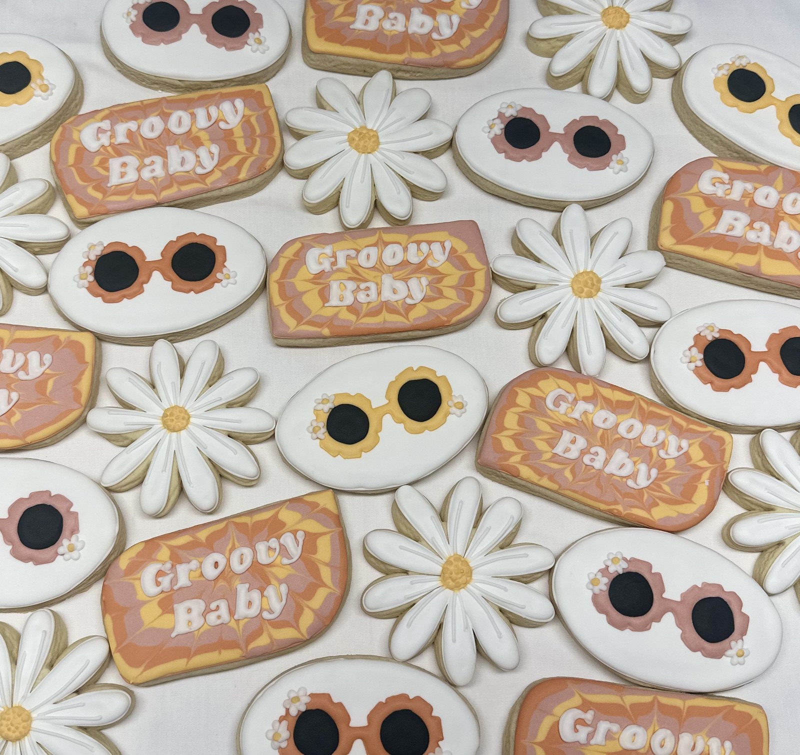 Retro Groovy Baby cookies with daisies and sunglasses