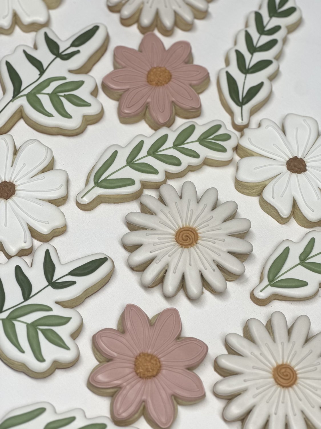 Example of Simple Cookies — clean daisy floral cookies on a parchment-lined tray